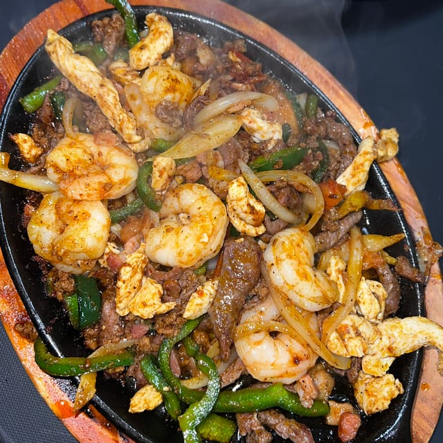 3 Amigos Fajitas (Chicken, Steak, Shrimp).